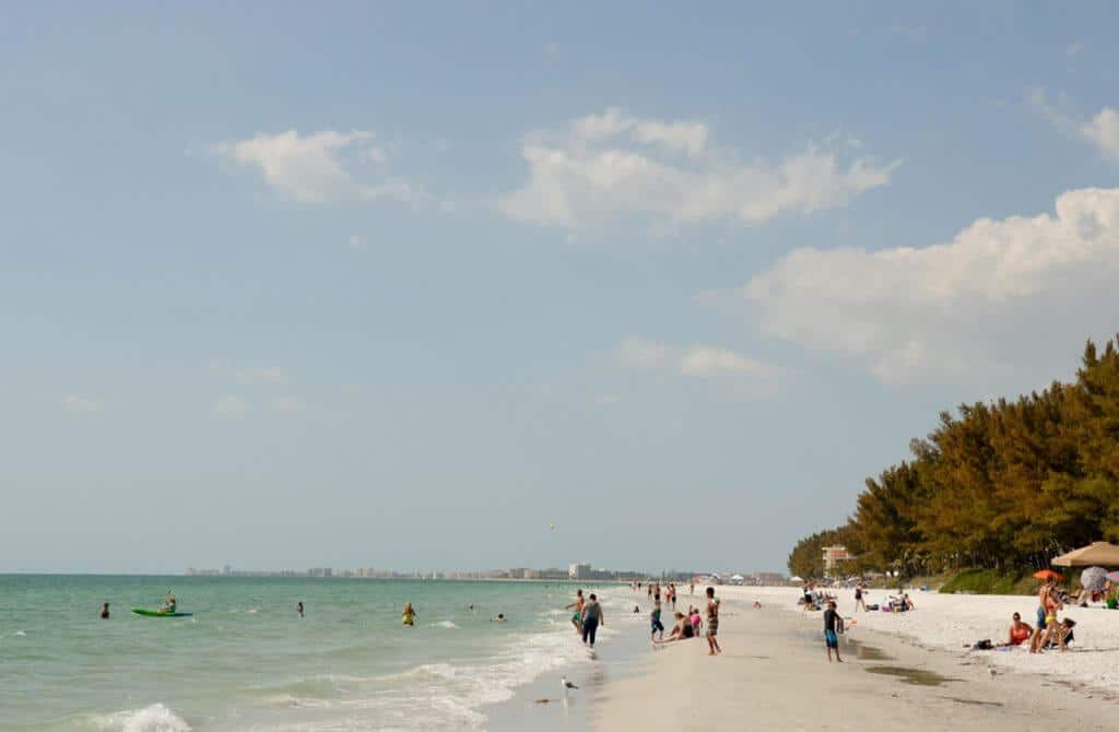 People spend their sunny day at St. Pete's beach, Florida